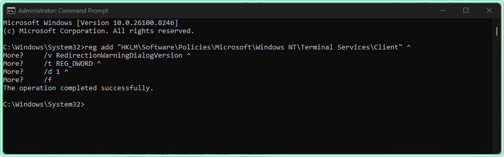 Elevated Command Prompt showing reg add command creating RedirectionWarningDialogVersion registry key with The operation completed successfully message